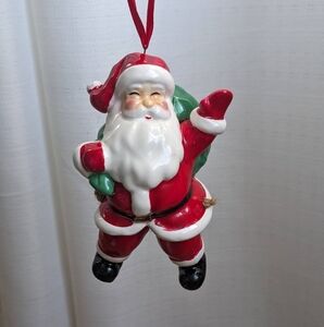 Vintage Traditional Santa Claus Christmas Ornament with swinging legs. 3.5"